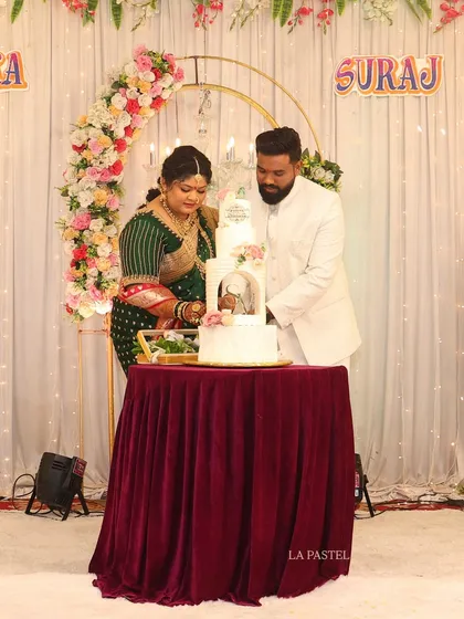 Seeing my creations become part of your special moments is the best feeling. Here's a beautiful couple cutting their custom four-tier engagement cake, marking the start of their new journey together.