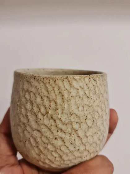 The neutral tones and natural textures of this ceramic candle holder bring aesthetic vibes to your space. It is the perfect ceramic piece for your candles.