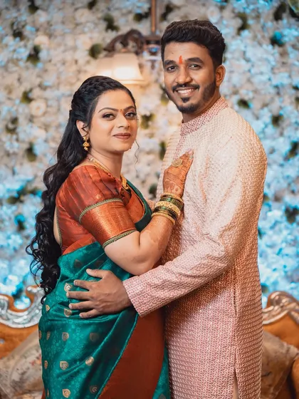 A slightly different pose from the same engagement shoot, showing the couple's comfortable and affectionate bond.