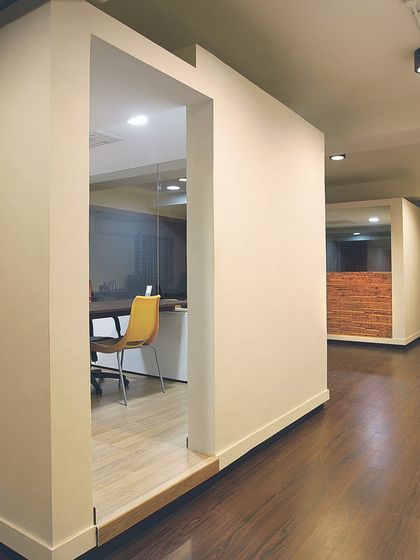 These are the 'container' meeting rooms at the White Canvas office. We placed them in the middle of the floor plan so that the main work areas along the windows could get all the benefits of natural light and air.