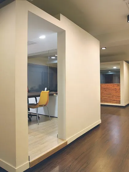 These are the 'container' meeting rooms at the White Canvas office. We placed them in the middle of the floor plan so that the main work areas along the windows could get all the benefits of natural light and air.