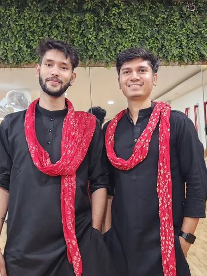 Two of our instructors dressed in traditional attire for Garba Night, ready to lead the celebration.