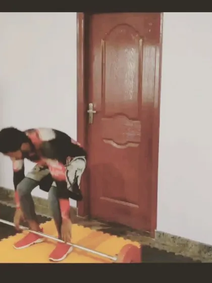 Setting up for a power clean. The focus is on maintaining a strong, neutral spine before initiating the lift from the floor.