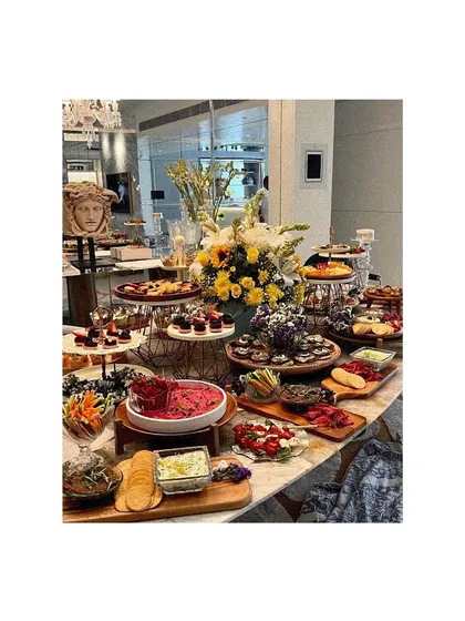 My grazing tables are designed to be a feast for the eyes and the palate. This lavish spread features an abundance of artisanal cheeses, charcuterie, fresh fruits, dips, and breads, creating a welcoming centerpiece for any celebration.