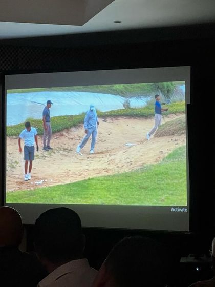 A video of my player's winning moments being shown at his felicitation. We document and celebrate these milestones to inspire others.