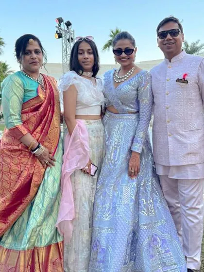 A dapper dad and his beautiful daughter in coordinated shades of regal pastels. His custom bandi and kurta set complements her stunning lehenga perfectly.