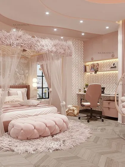 Fall in love with the pink shades of this stunning girl's bedroom. The design features a princess-style canopy bed, a hanging swing chair, and soft, cloud-like lighting to create a dreamy sanctuary.