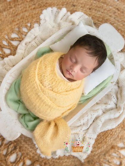 Like a little piece of candy, this baby is wrapped in a sweet yellow knit. I love using natural textures like this jute rug to add an earthy element to the photos.