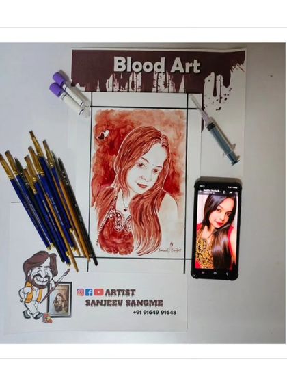 Here you can see the tools of my trade: the reference photo, the blood sample, my brushes, and the finished portrait. Each element plays a crucial role in transforming a personal essence into a lasting piece of art.