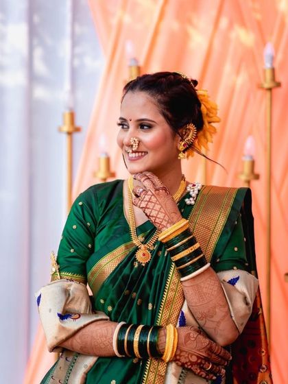 A timeless and glamorous look. The makeup is elegant and sophisticated, perfect for a bride who wants to make a statement.