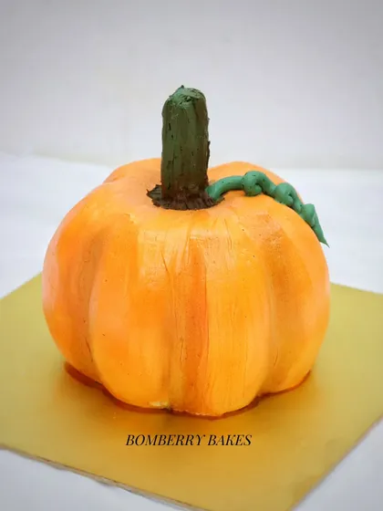 A sculpted pumpkin cake, a fun project we do in my sculpting and carving class.