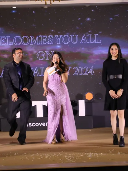 Leading a fun activity on stage at the CINDA Annual Day. My interactive hosting style is perfect for team-building and making annual corporate functions more than just a formality.