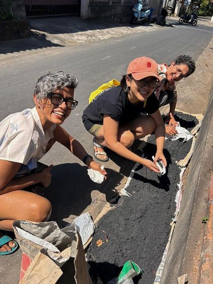 Foraging for materials in Bali with fellow artists. We collected volcanic sand and other natural materials to use in our surface treatments, connecting our work directly to the place.