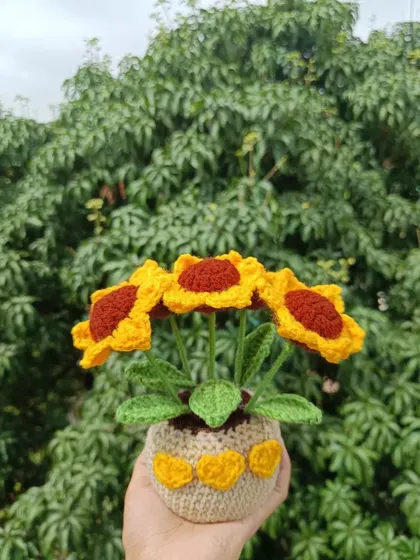 A custom multi-headed sunflower pot, a fun and unique design.