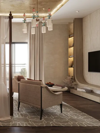 The seating area in this Zen-inspired bedroom features a custom TV unit with curved, organic lines and integrated shelving. The space is designed for rest and reflection, balancing grounding with grace.