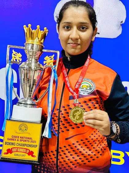 We don't just train, we build champions. Here is our star boxer, Prisha Pawar, with her gold medal and trophy from the CISCE National Games & Sports 2023, a testament to her hard work and our dedicated coaching.