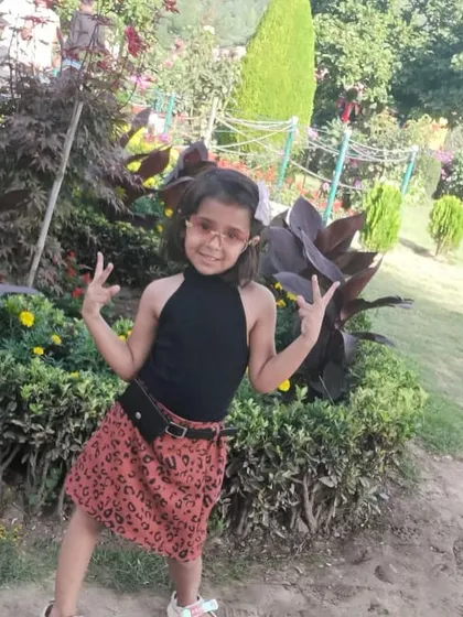 A cute outdoor photo from a young participant's portfolio.