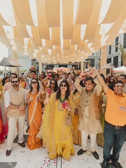 The sheer energy of the guests during the 'phoolon ki haldi'. Everyone got involved, showering the couple with love and petals.