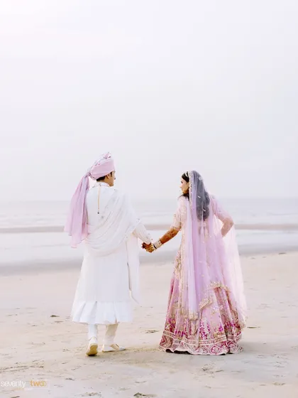 The couple takes a walk along the misty Goa beach after their ceremony, a quiet, romantic end to a magical day.