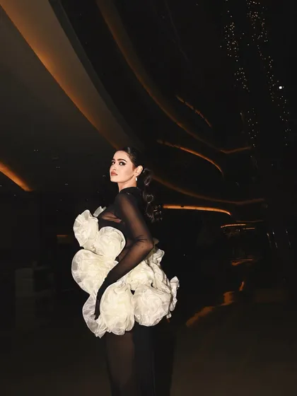 A dramatic, full-length shot from Lakme Fashion Week. I created a bold, glamorous look with a sculpted bubble ponytail to complement this architectural Shantanu and Nikhil gown.