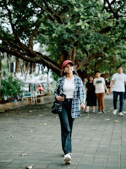 Another shot from the walking sequence, capturing a natural, in-between moment that feels authentic and unposed.