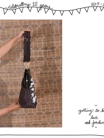 A detail shot of the Lace Oak Jordan's adjustable and detachable shoulder straps.