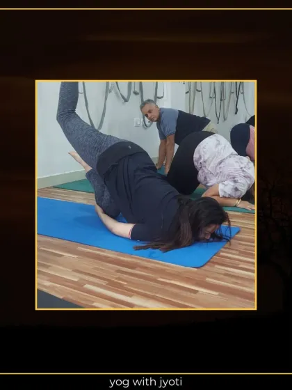 Strength, flexibility, and dedication on display. This student is in a challenging inverted pose, showing great control.