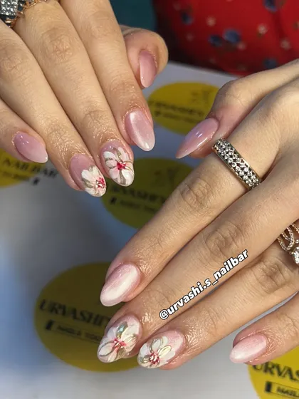 A romantic and soft design with hand-painted florals on a delicate blush base. The brushstroke effect on the petals gives them dimension and an artistic, timeless feel.