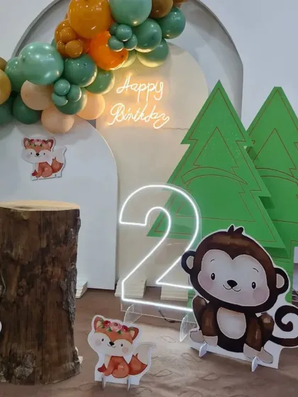 A close-up on the right side of the jungle setup, featuring the cheeky monkey and the glowing number '2'.