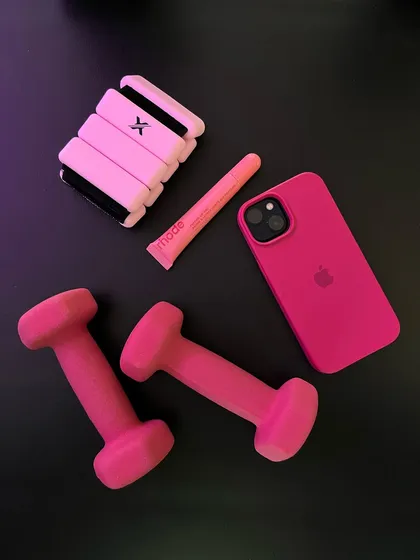 I identify as a Pilates Princess, and these are my essentials. All pink everything, from my weights to my phone case.