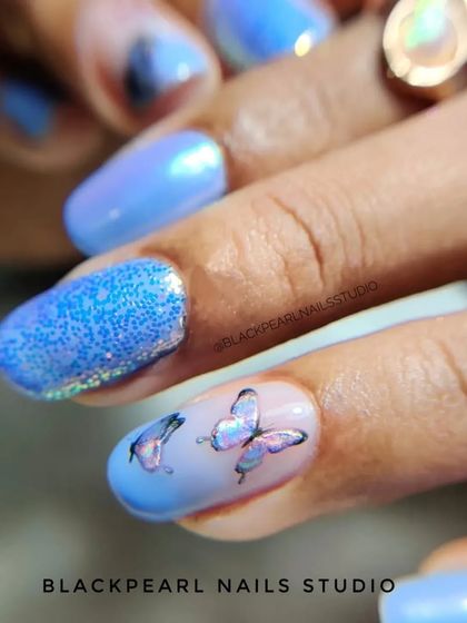 A beautiful and whimsical design featuring lilac chrome, unicorn glitter, and butterfly sticker art. This set combines multiple effects for a magical and eye-catching result.