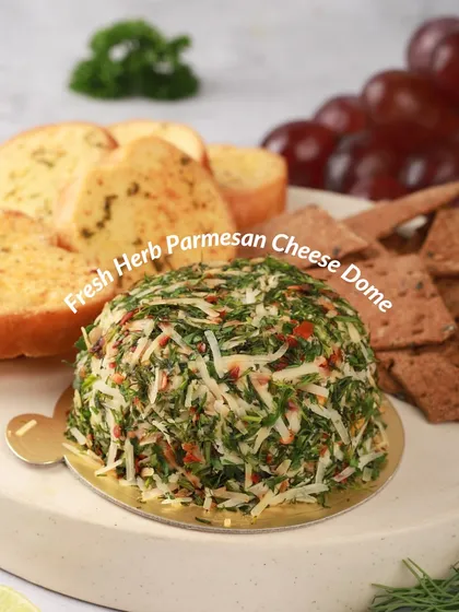 Our Fresh Herb Parmesan Cheese Dome is coated in a generous layer of chopped herbs and grated parmesan. It's a fresh, savory, and incredibly versatile cheese that pairs well with almost anything.