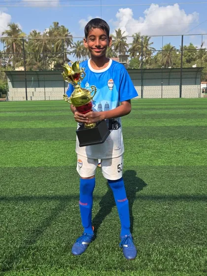 Another proud member of the U14 Feugo Lions with his trophy.