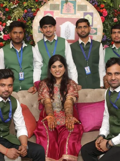 For a big wedding, you need a team you can rely on. Here I am with my team of professional artists, ready to create beautiful designs for the bride and all the guests. We make sure everyone is part of the celebration.