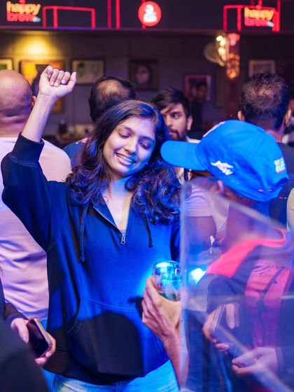 A guest enjoying a drink and the music.