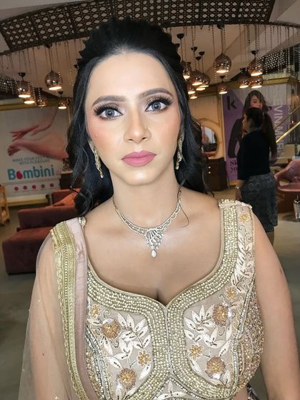 Another angle highlighting the flawless base and soft contouring.