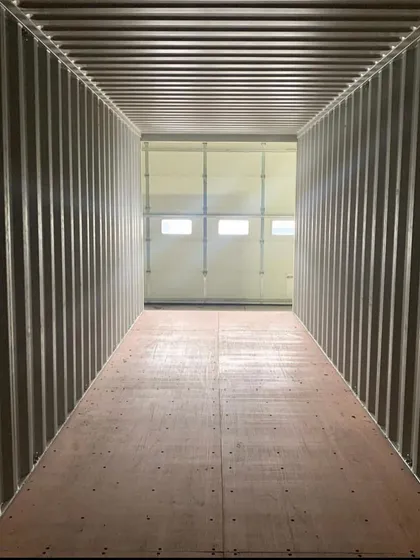 The potential of an empty container is limitless. This image shows the vast, open space of a high-cube unit in our facility, ready to be transformed according to a client's unique vision and functional requirements.