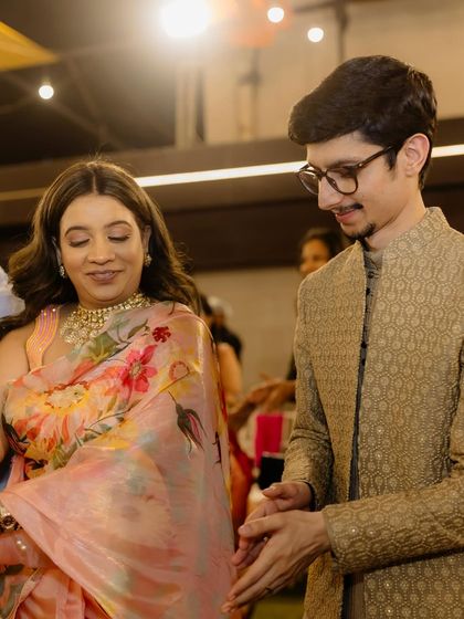 A candid moment of dancing and joy. The makeup for the bride's sister was designed to look great both in photos and in motion.