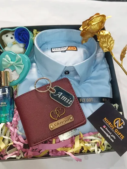 This Valentine's Day hamper is all about love, featuring a personalized couple's wallet, a shirt, perfume, a golden rose, and a heart-shaped box.
