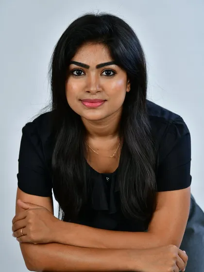 A professional and polished look suitable for the office or corporate headshots. The makeup is subtle, enhancing features without being distracting, to project confidence.