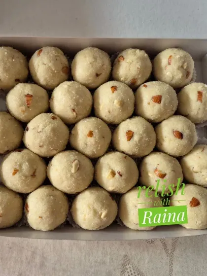 A box of Rava Laddoos, also known as Sooji Laddoos. In Rajasthan, we call them Panchdhaari ke Laddoo as they are made with five main ingredients: rava, ghee, mawa, dry fruits, and sugar.