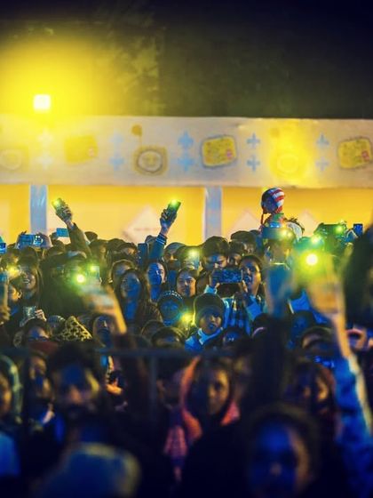A sea of mobile flashlights creating a magical atmosphere at the Pithe Puli Utsav. We are always in awe of the love from our audience.