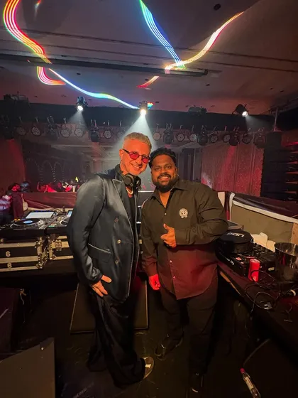 Sharing a moment with a fellow DJ at the console. The industry is all about connections, and I love sharing the stage and energy with other talented artists.