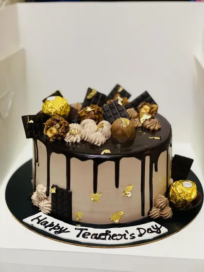 Nothing says 'thank you' like a rich, decadent chocolate cake. This Ferrero Rocher cake, loaded with Nutella and hazelnut, is the perfect way to show appreciation. It's a popular choice for special occasions like Teacher's Day or as a corporate gift.