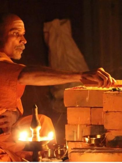Lighting the sacred fire during a havan. This act represents the illumination of knowledge dispelling the darkness of ignorance.