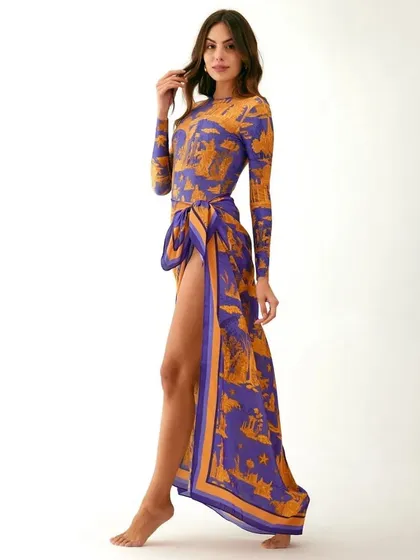 A versatile look from Tizzi, pairing a surfsuit with a sarong. This shot highlights our ability to style and shoot multi-use garments for e-commerce and campaign lookbooks.