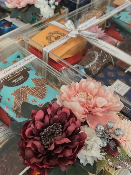 With love! A close-up on the floral details and custom ribbon that finish off my luxury acrylic gift boxes, making them perfect for any special occasion.