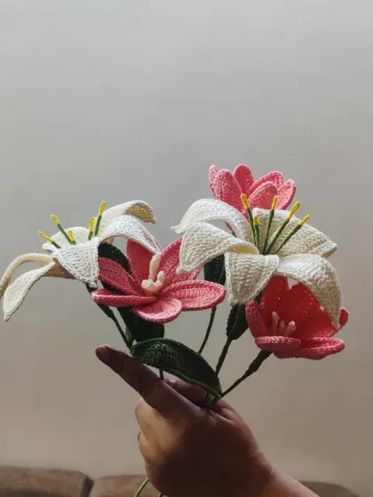 A beautiful, handcrafted bouquet of crochet lilies and tulips. These everlasting flowers are a perfect, sustainable gift that captures the beauty of fresh blooms without ever fading.