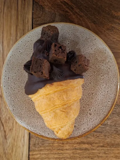A decadent chocolate-dipped croissant from La Croute. Their dedicated pie and pastry room is a highlight of the bistro.
