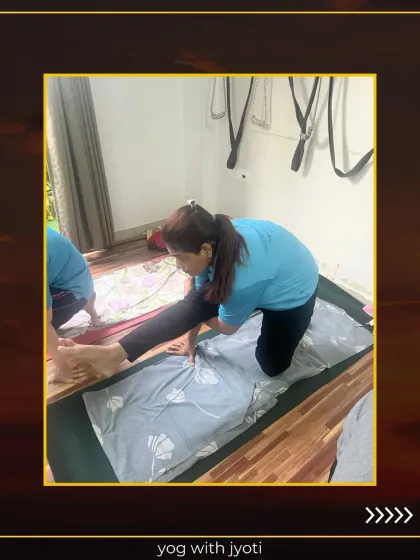 Using a simple prop like a cloth can help in achieving a deeper hamstring stretch.